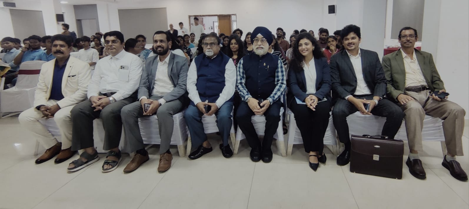 IMCCI leadership seated among students and participants in the launch audience