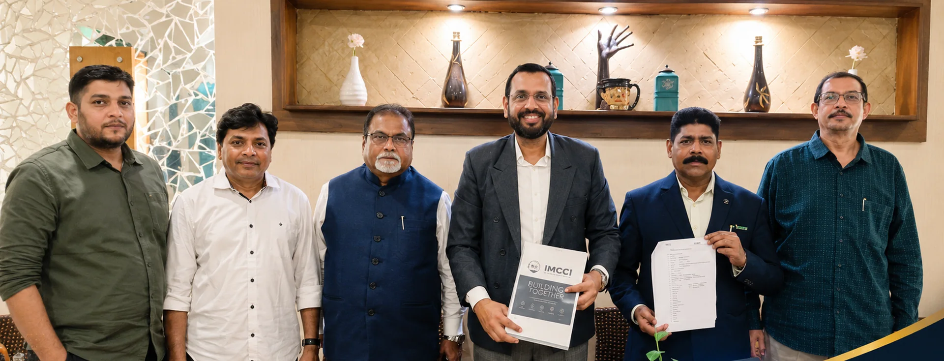 The founding team of the Indian Minorities Chamber of Commerce & Industry with the official IMCCI charter document