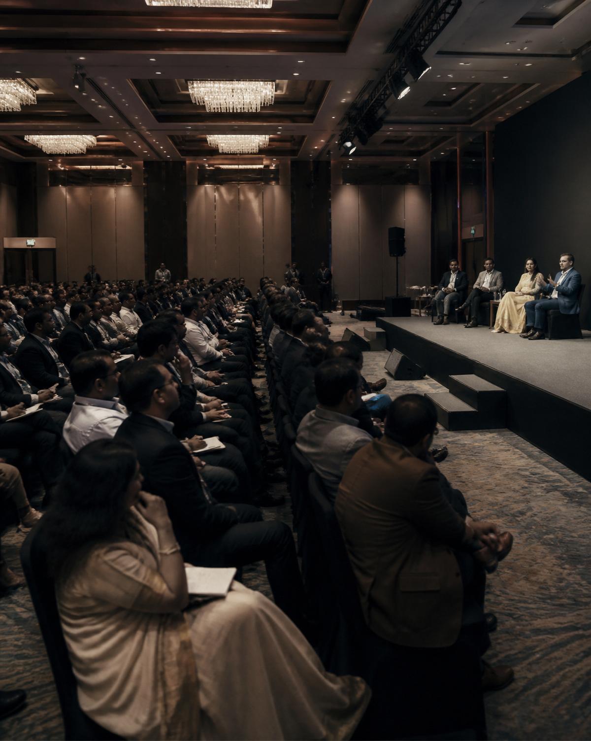 National MSME Summit stage with panel discussion in progress